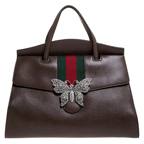 gucci backpack butterfly|gucci bag with butterfly buckle.